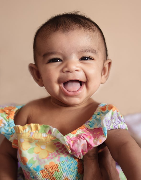 Photograph of baby laughing
