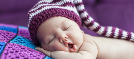 A photo of a sleeping baby.
