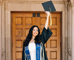 Youstina Labib in graduation cap and gown.