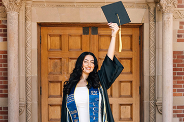 Youstina Labib in graduation cap and gown.