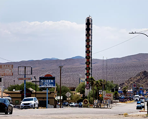 A giant thermometer in Baker, Calif., reads 112 degrees.