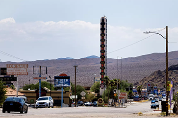 A giant thermometer in Baker, Calif., reads 112 degrees.