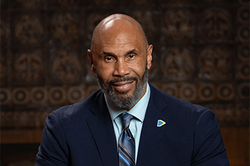 horizontal head-and-shoulders portrait of Darnell Hunt in suit and tie