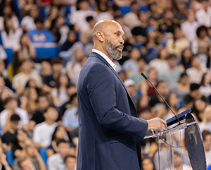 UCLA Interim Chancellor Darnell Hunt stands at a podium