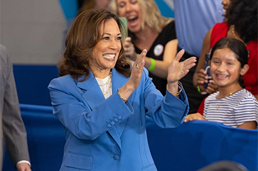 Vice President and Democratic presidential nominee Kamala Harris claps at event at Wake Tech in Raleigh, N.C.