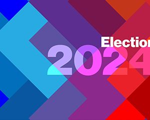 Abstract image of Tetris-like shapes with a color gradient ranging from blue hues on the left to red hues on the right, with purple in the middle, and the text "Election 2024"