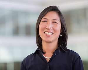 Portrait of Maureen Su in dark blue top