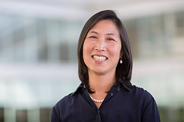 Portrait of Maureen Su in dark blue top