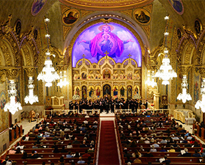 Interior of Saint Sophia Greek Orthodox Church with performers on stage