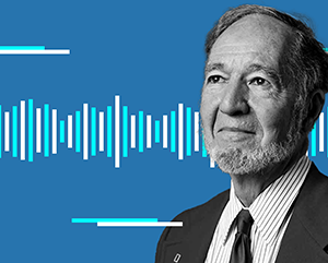 A black and white photograph of Jared Diamond against a blue background with a static white and light blue soundwave illustration spread out horizontally