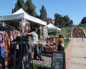 Vendor Terrance Kendrick sets up shop on campus for the ‘Blatinx on the Block’ event.