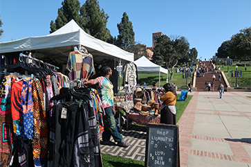 Vendor Terrance Kendrick sets up shop on campus for the ‘Blatinx on the Block’ event.