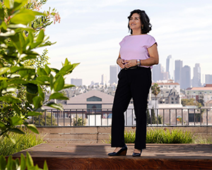 Castro Ramírez on the rooftop of the Eaves in Koreatown, which provides 57 affordable housing units in Los Angeles.