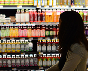 A woman grocery shopping.