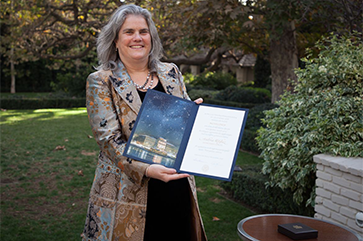 Andrea Ghez receiving her Nobel Prize citation.