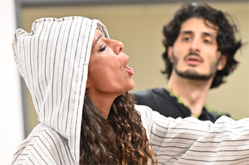 Ianthe Marini, in profile, singing with UCLA student Vasken Ohanian in background