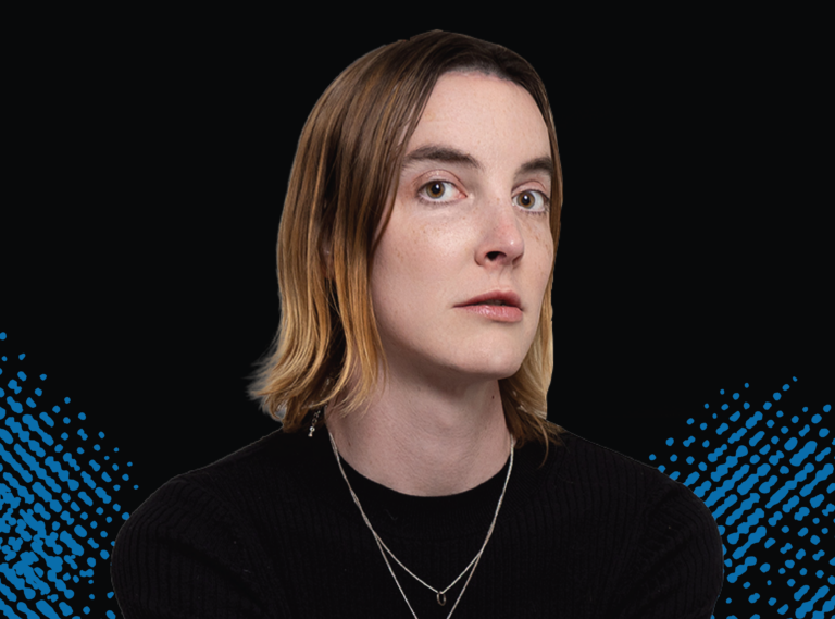 UCLA scholar Wesleigh Gates is pictured in front of a dark background.